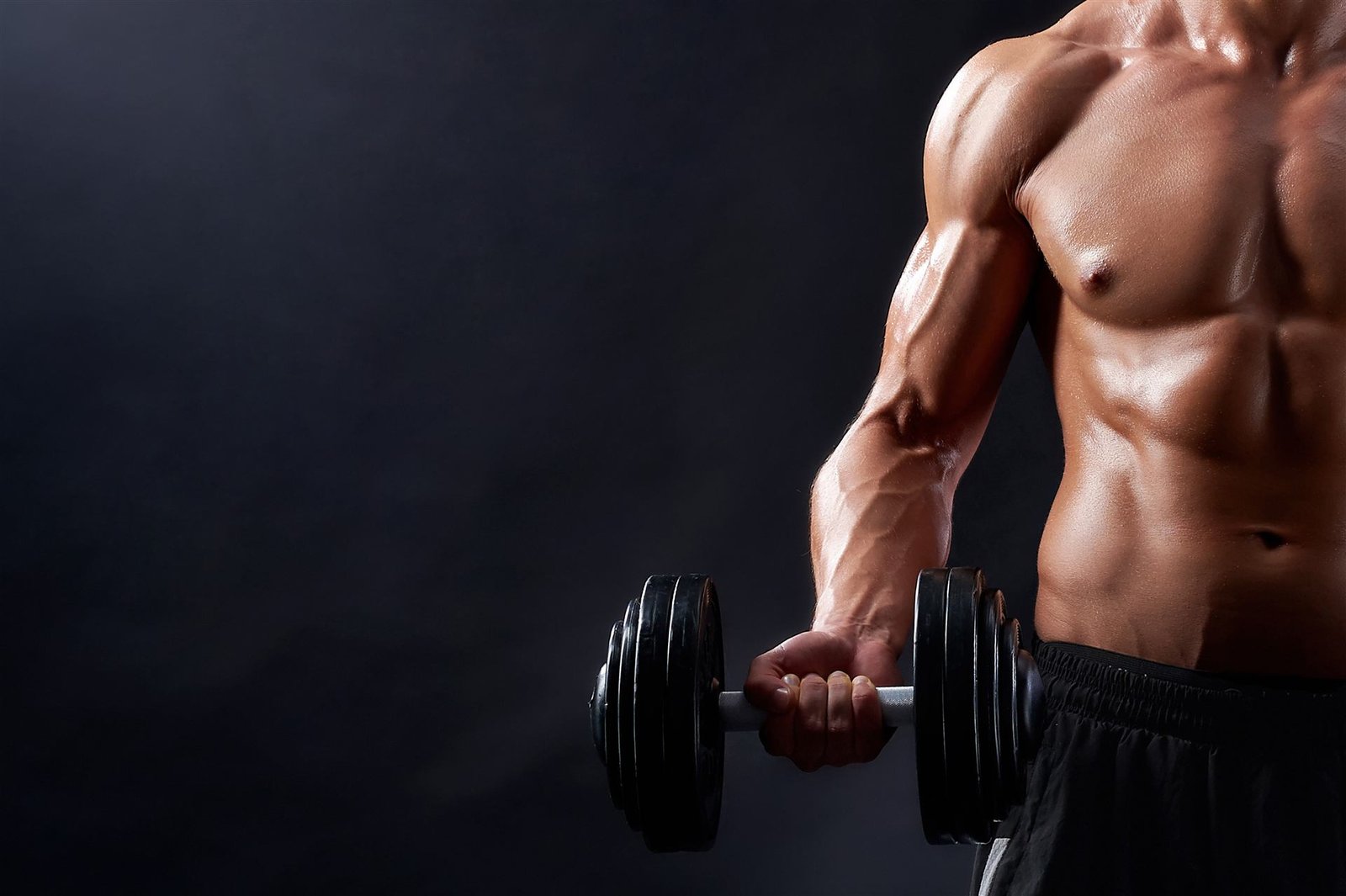 Athlete training with free weights